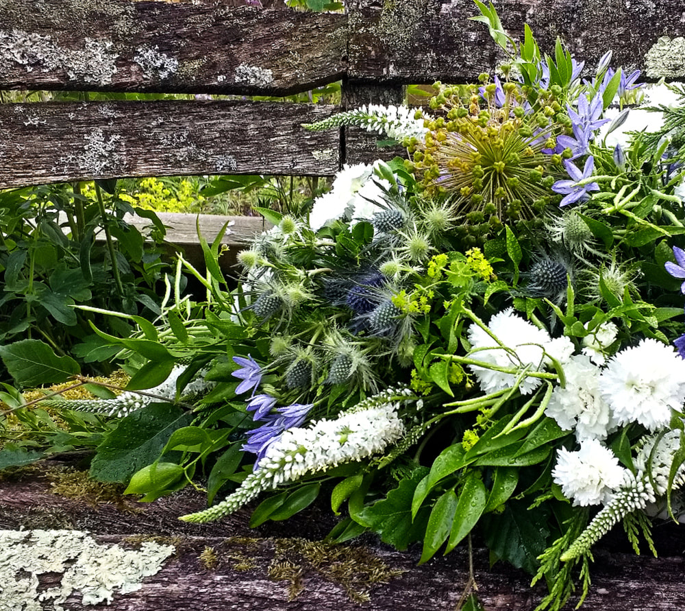 Natural Funeral Spray of Blue & White Summer cottage garden flowers. Copyright www.GallowayFlowers.co.uk